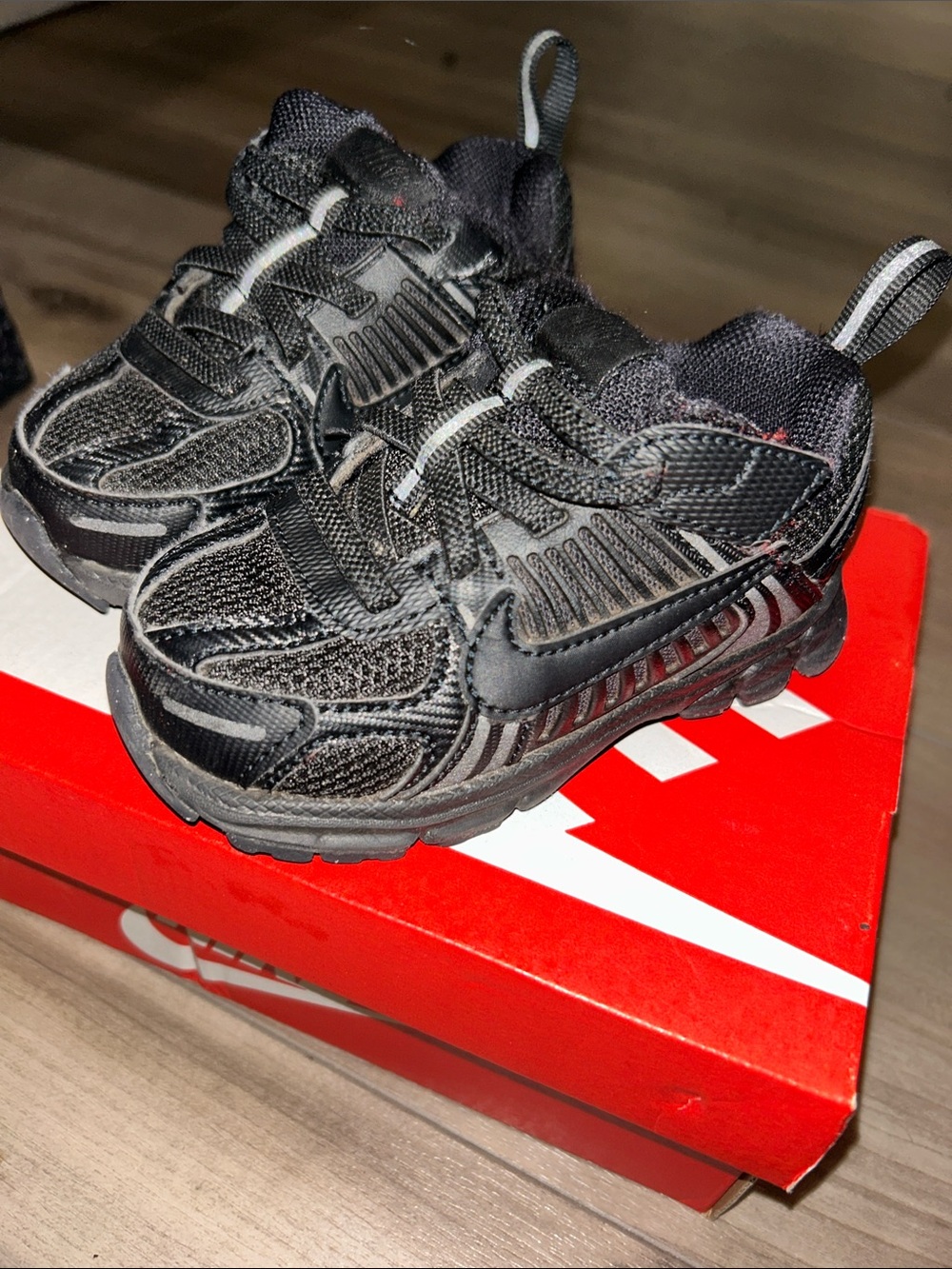 Nike Black Kids' Athletic Sneakers with Subtle Reflective Accents